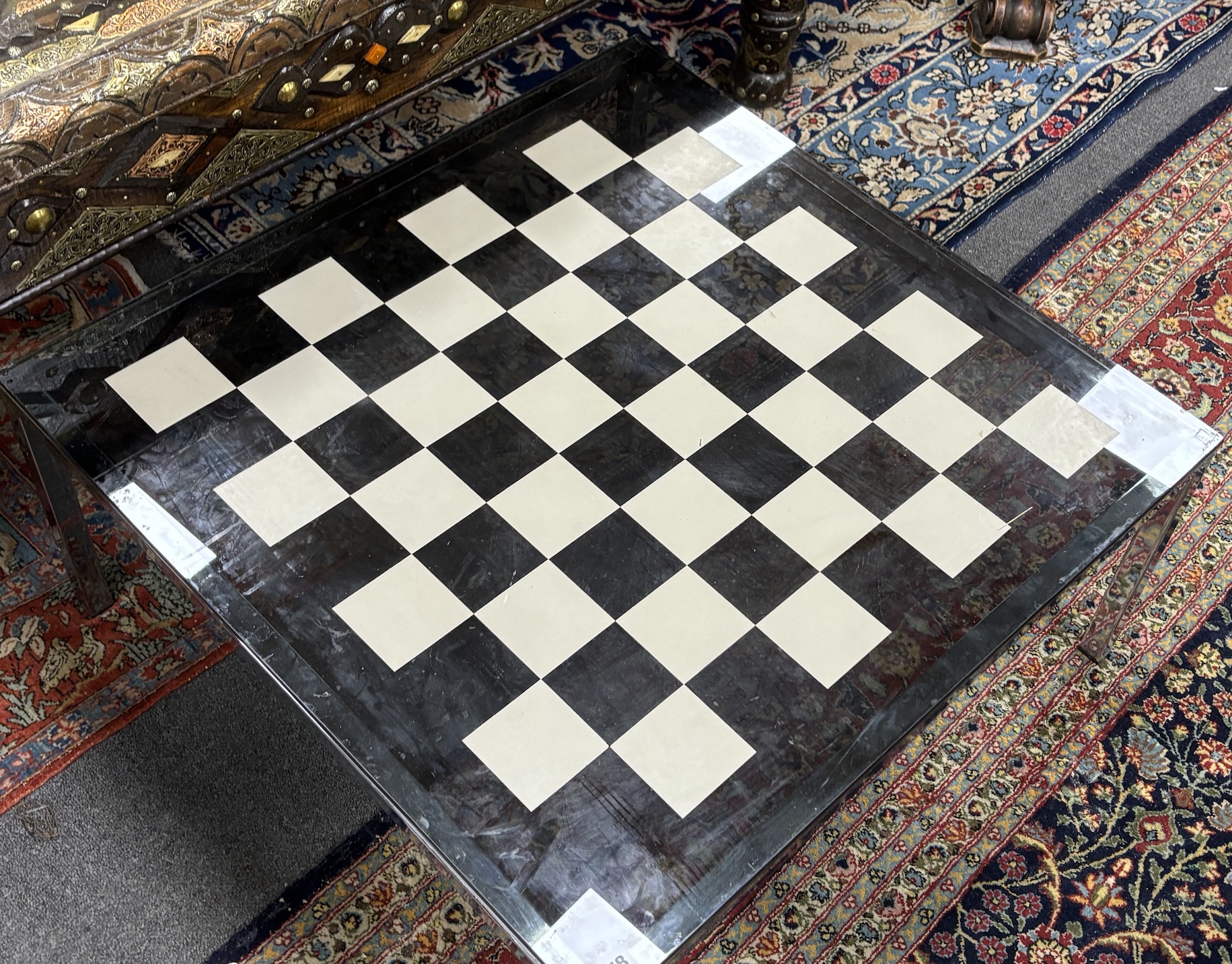 A 20th century square glass and chrome low games table, width 74cm, height 35cm